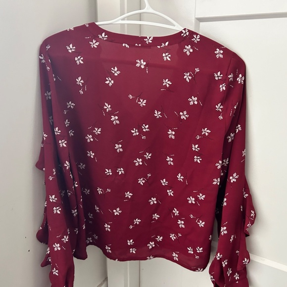 Pretty Red Blouse with White Flowers and Frills along Sleeves - Picture 3 of 3